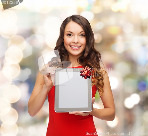 Image of smiling woman with tablet pc