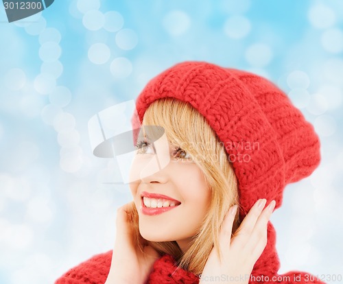 Image of smiling young woman in winter clothes