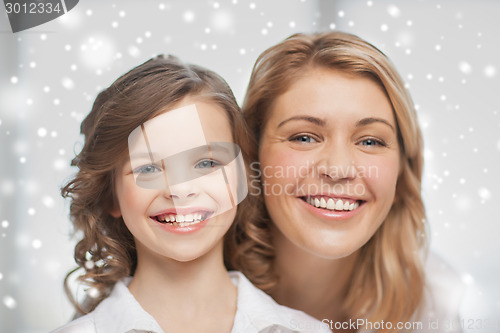 Image of happy mother and daughter