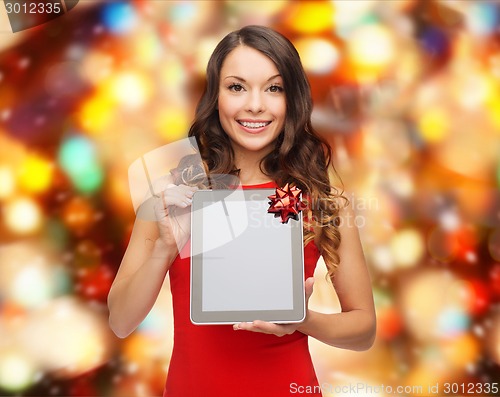 Image of smiling woman with tablet pc