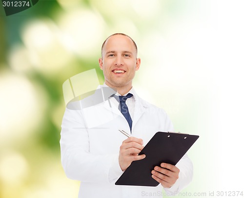 Image of smiling male doctor with clipboard