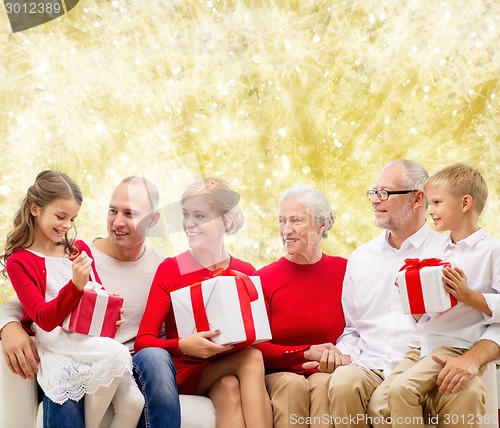 Image of smiling family with gifts