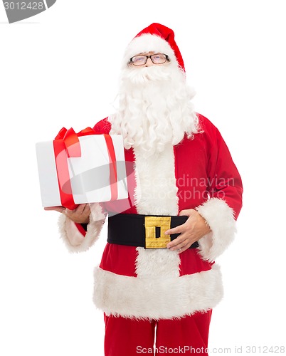 Image of man in costume of santa claus with gift box