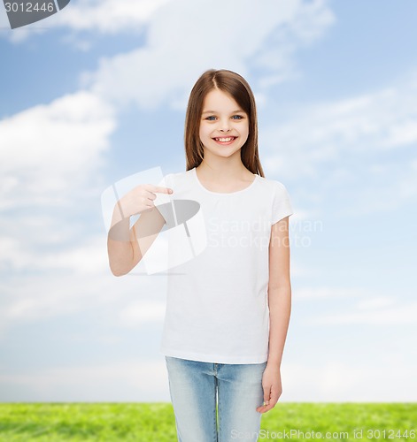 Image of smiling little girl in white blank t-shirt