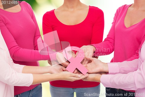 Image of close up of women with cancer awareness ribbons