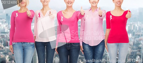 Image of close up of women with cancer awareness ribbons