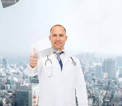 Image of smiling doctor with stethoscope showing thumbs up