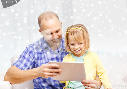 Image of happy father and daughter with tablet pc computer