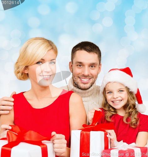 Image of happy family with gift boxes