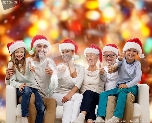 Image of happy family sitting on couch