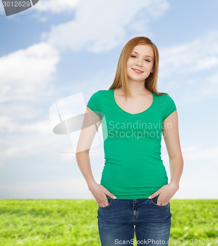 Image of smiling teenage girl in casual clothes