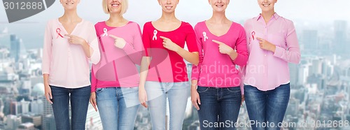 Image of close up of women with cancer awareness ribbons