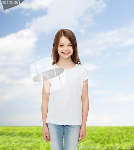 Image of smiling little girl in white blank t-shirt
