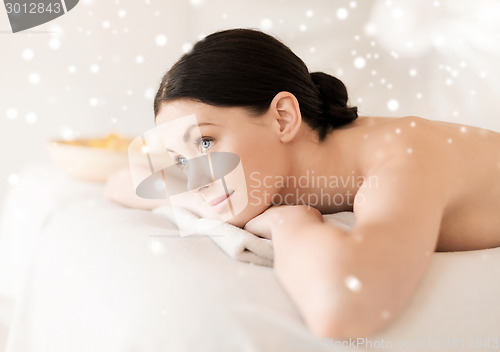 Image of beautiful young woman in spa