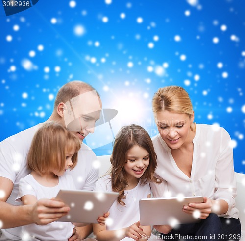 Image of happy family with tablet pc computers