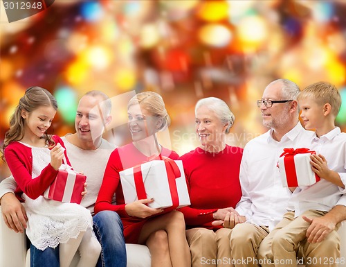 Image of smiling family with gifts
