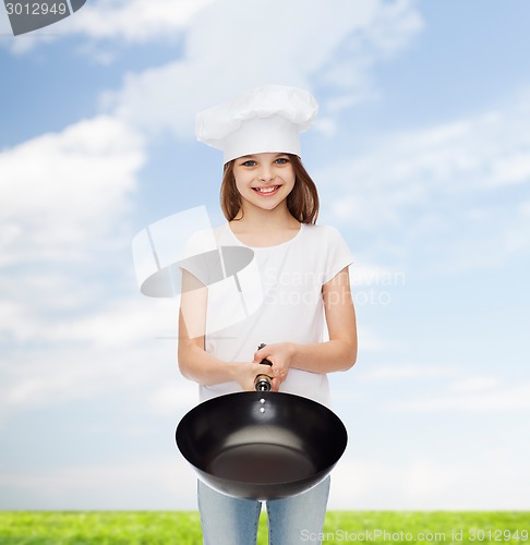 Image of smiling little girl in white blank t-shirt