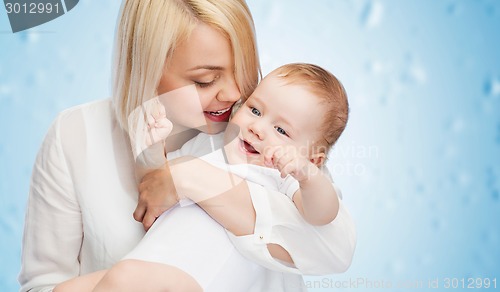 Image of happy mother with smiling baby