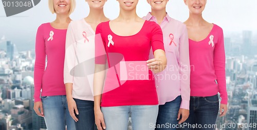 Image of close up of women with cancer awareness ribbons