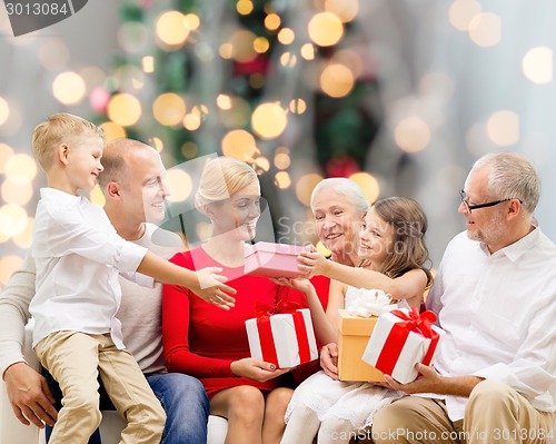 Image of smiling family with gifts