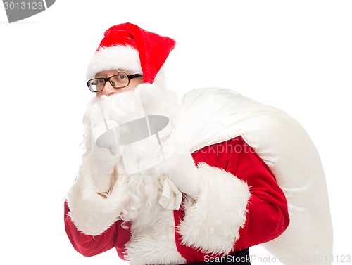 Image of man in costume of santa claus with bag