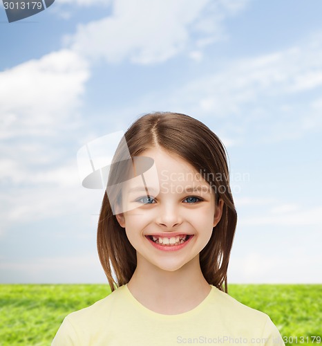 Image of smiling little girl over white background