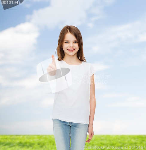 Image of smiling little girl in white blank t-shirt