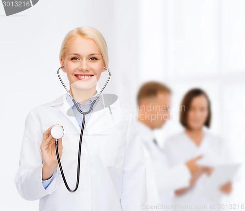 Image of smiling female doctor with stethoscope