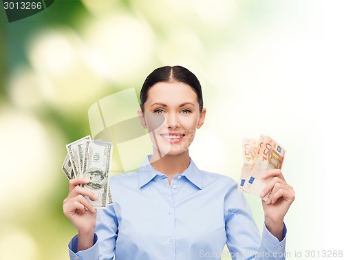 Image of businesswoman with dollar cash money