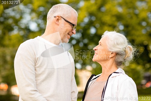 Image of senior couple in city park
