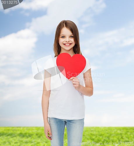 Image of smiling little girl in white blank t-shirt