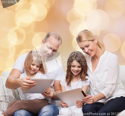 Image of happy family with tablet pc computers