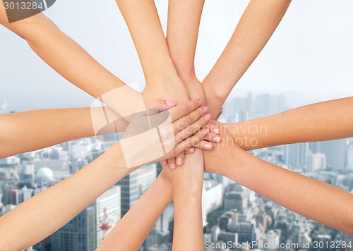 Image of close up of hands on top