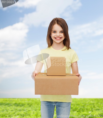 Image of smiling little girl in white blank t-shirt