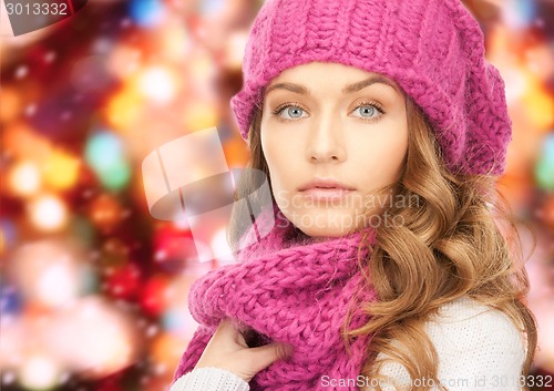 Image of close up of young woman in winter clothes