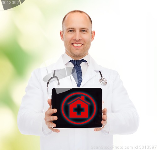 Image of smiling male doctor with stethoscope and tablet pc
