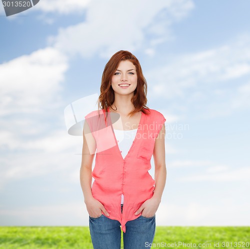 Image of smiling teenage girl in casual clothes