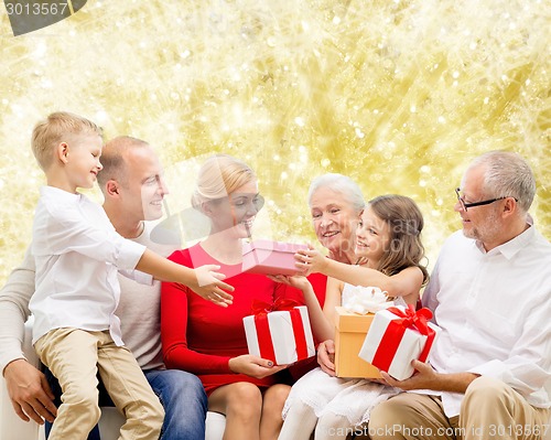 Image of smiling family with gifts