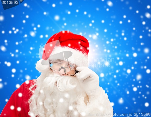 Image of close up of santa claus winking