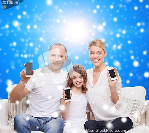 Image of happy family with smartphones