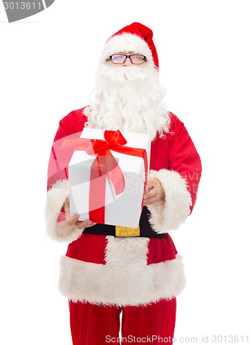 Image of man in costume of santa claus with gift box