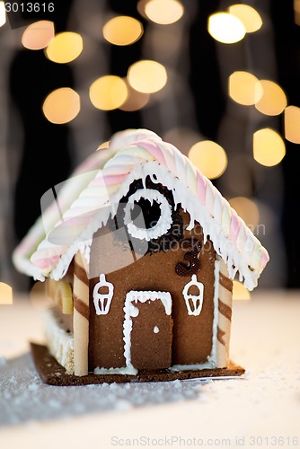 Image of closeup of beautiful gingerbread house at home