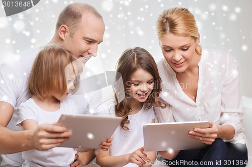 Image of happy family with tablet pc computers