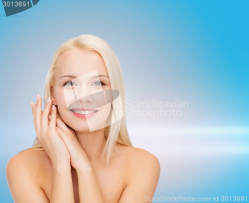 Image of face and hands of happy woman