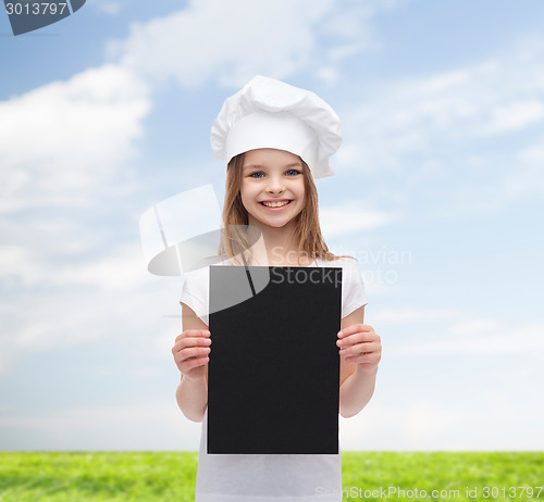 Image of little cook or baker with blank black paper