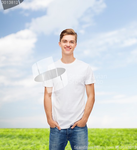 Image of smiling young man in blank white t-shirt