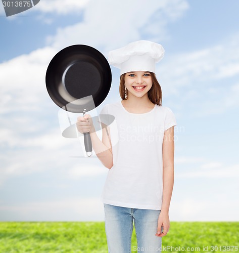 Image of smiling little girl in white blank t-shirt