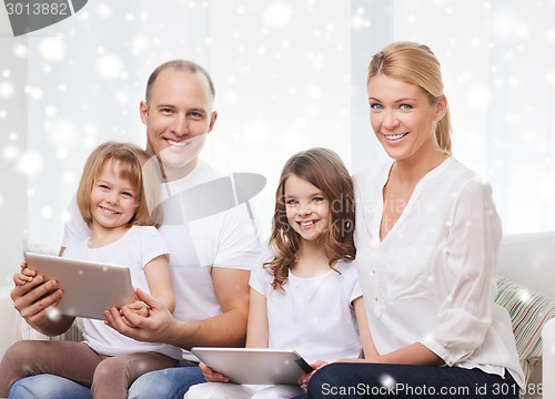 Image of happy family with tablet pc computers