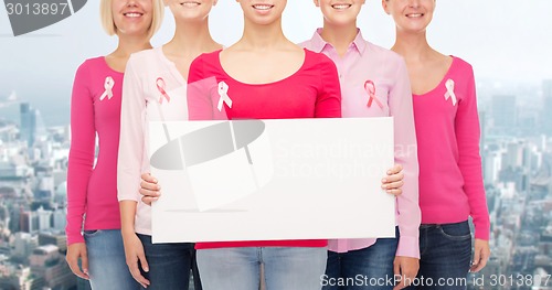 Image of close up of women with cancer awareness ribbons