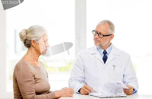 Image of senior woman and doctor meeting